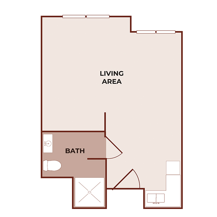 Floor plan of a studio apartment showing a large living area, a small kitchen space, and a separate bathroom with a toilet, sink, and shower. Two windows are located on the top wall of the living area.